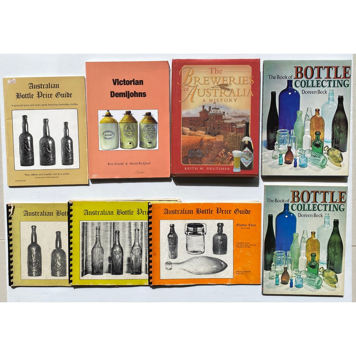 8 Collectors Books: Breweries of Australia 4 Roycroft Bottle Price Guides 2 x Doreen Beck Bottle Collecting Victorian Demijohns.