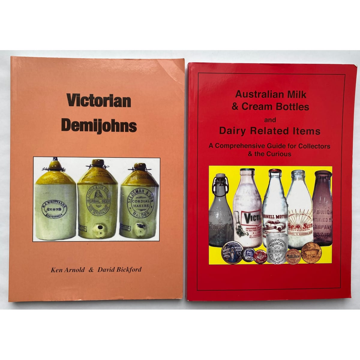 2 Books. Victorian Demijohns by Ken Arnold & David Bickford and Australian Milk & Cream Bottles by Richard S. Kameny.