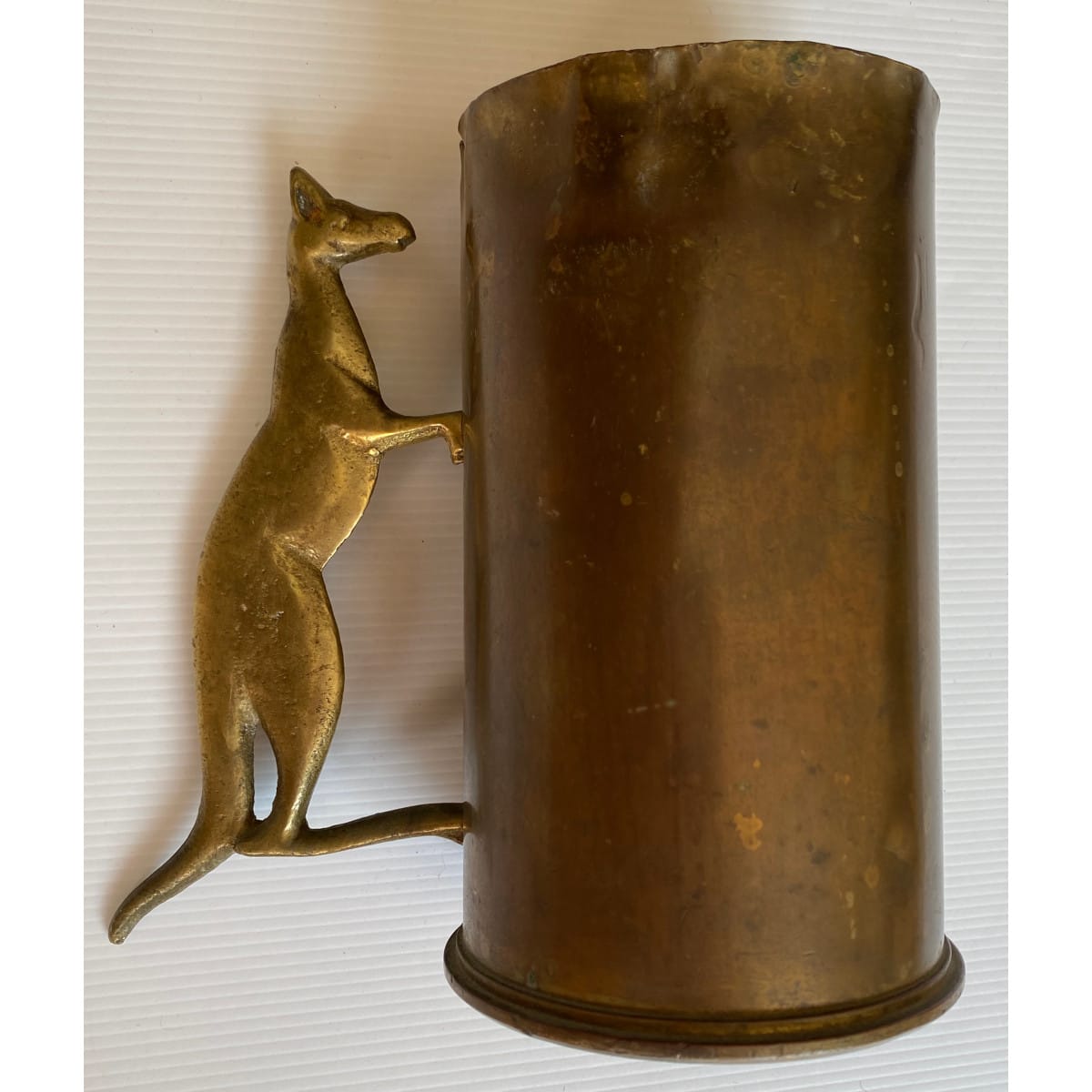 Trench Art Beer Mug. 18 Pounder shell with heavy brass Kangaroo handle applied.