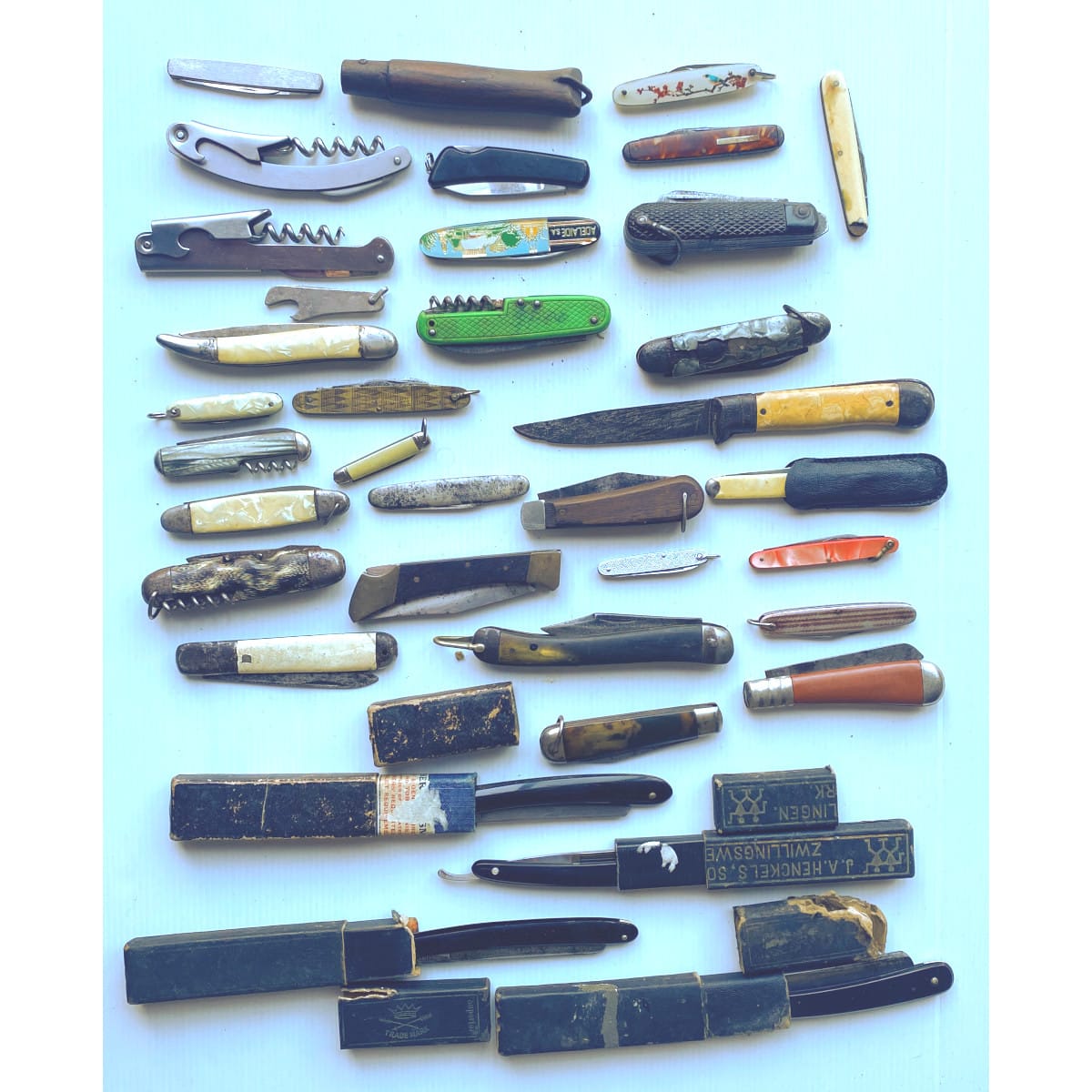 Big group of Cutthroat Razors, pocketknives and more.