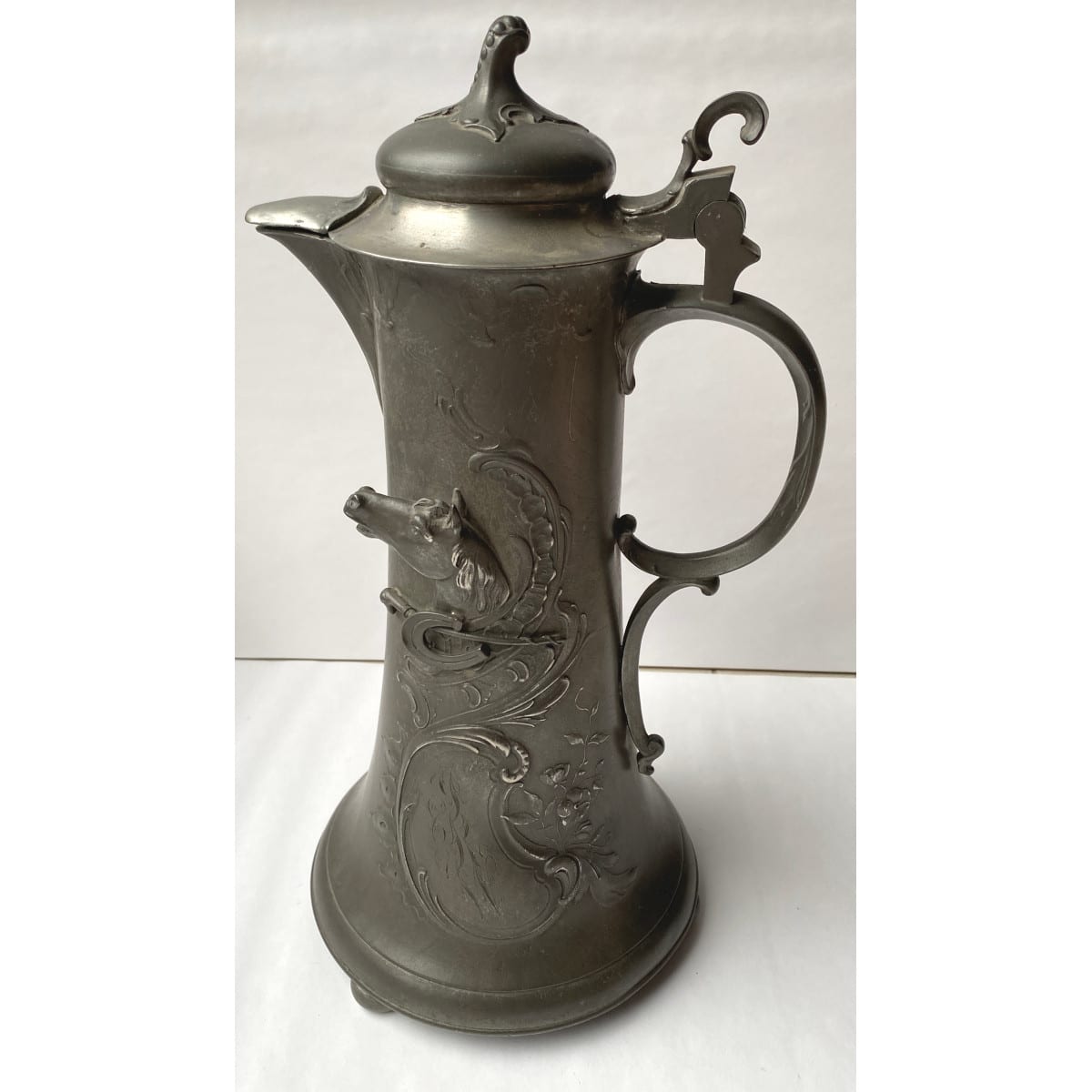 Large Pewter Tankard/Lidded Jug. Horse, Horseshoe & Whip raised decoration. Fancy JRW or similar engaved to lower front. Kayserzinn.