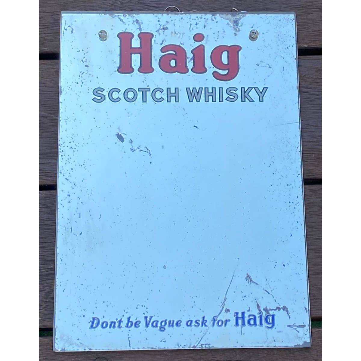 Advertising Mirror. Haig Scotch Whisky. Don't be Vague ask for Haig. Small hanging mirror.