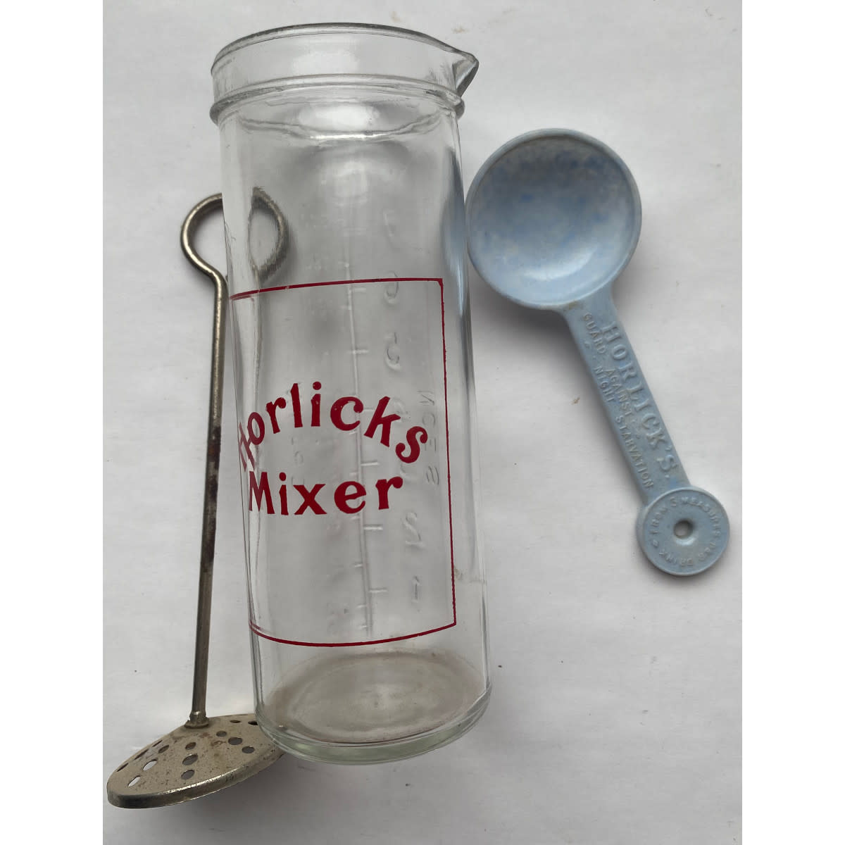 Horlicks Mixer with metal stirrer and Nally Ware bakelite type scoop "Horlick's, guard against night starvation"!