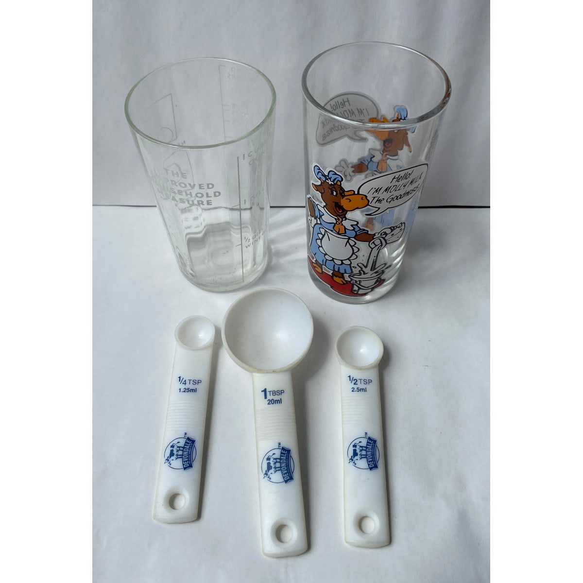 Household Group. Nutella glass with Molly Milk print Improved Household measure glass 3 Devondale Dairy plastic measuring scoops.