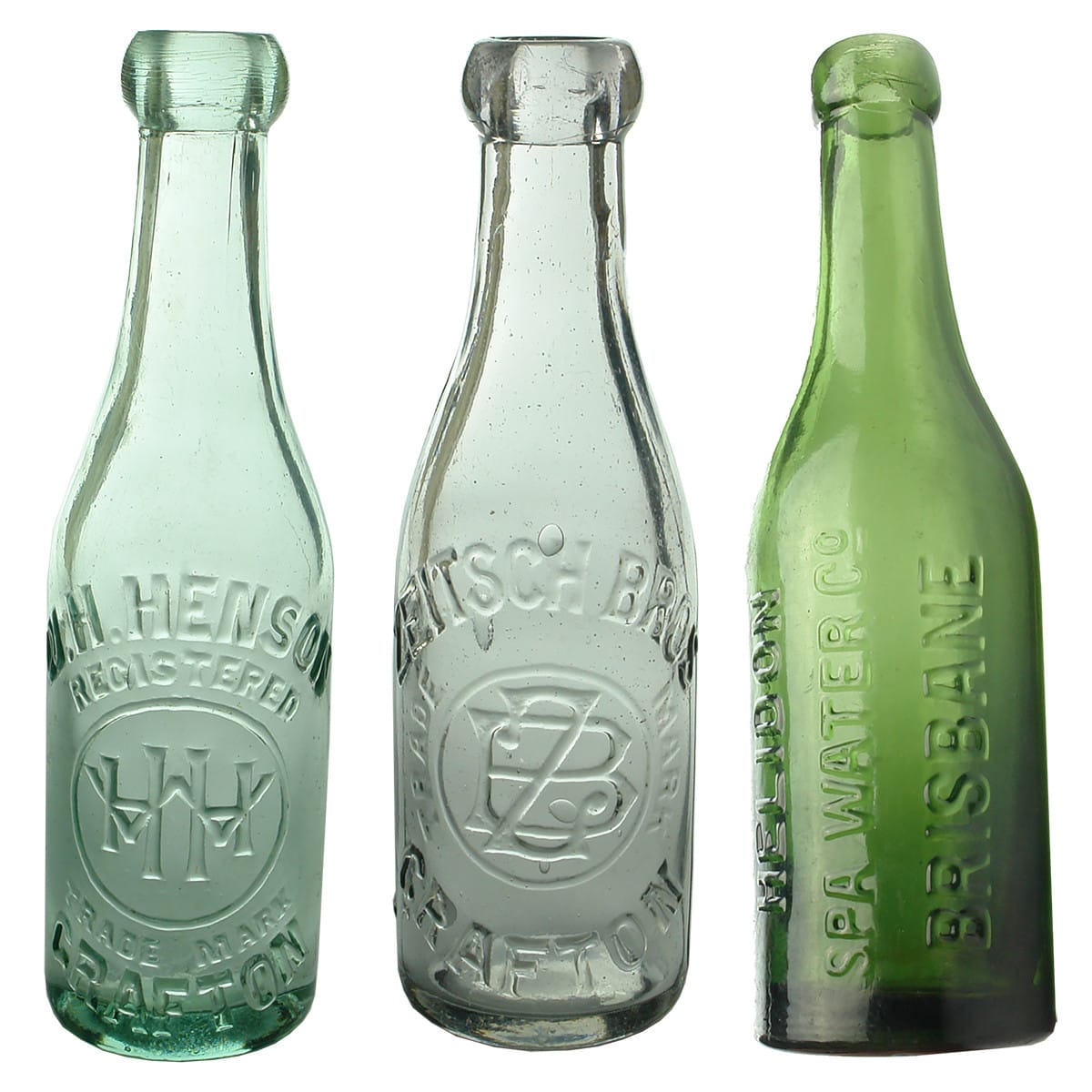 3 Blob top sodas. W. H. Henson, Grafton. Cannington Shaw base mark; Zeitsch Bros, Grafton. Clear 6 oz. (Zietsch Bros misspelt on the bottle); Helidon Spa Water Co., Brisbane. Green. 6 oz.