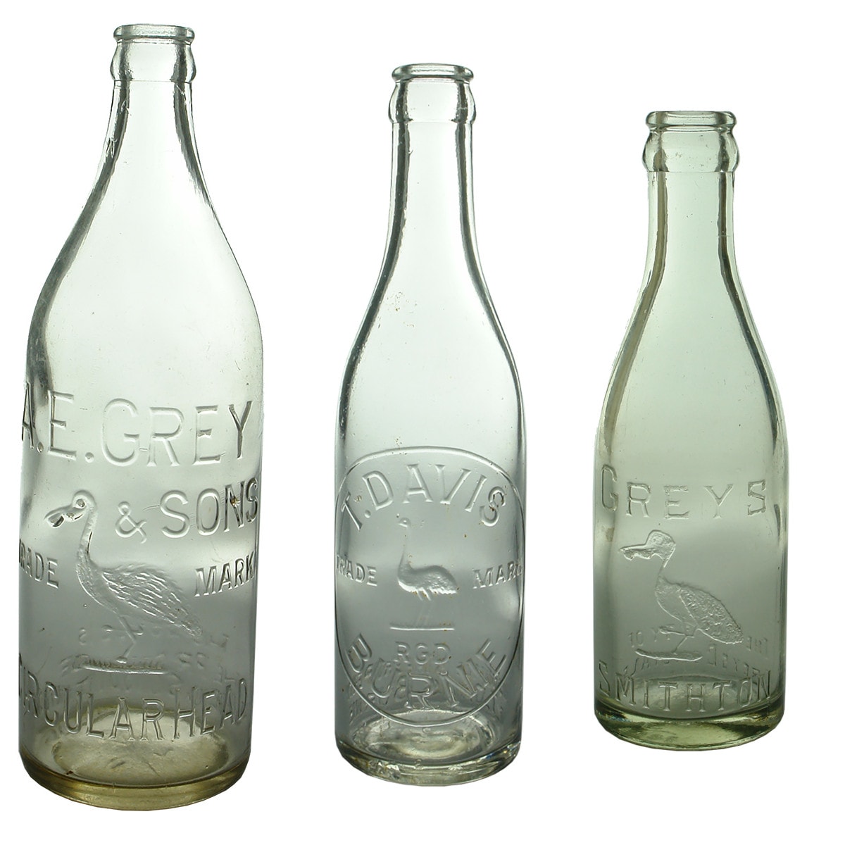 3 Tassie Crown Seals. A. E. Grey & Sons, Circular Head. Smithton. Pelican. 24 oz;  T. Davis, Burnie. Emu. Clear. 10 oz; Grey's Smithton. Pelican. Clear. 6 oz. (Tasmania)