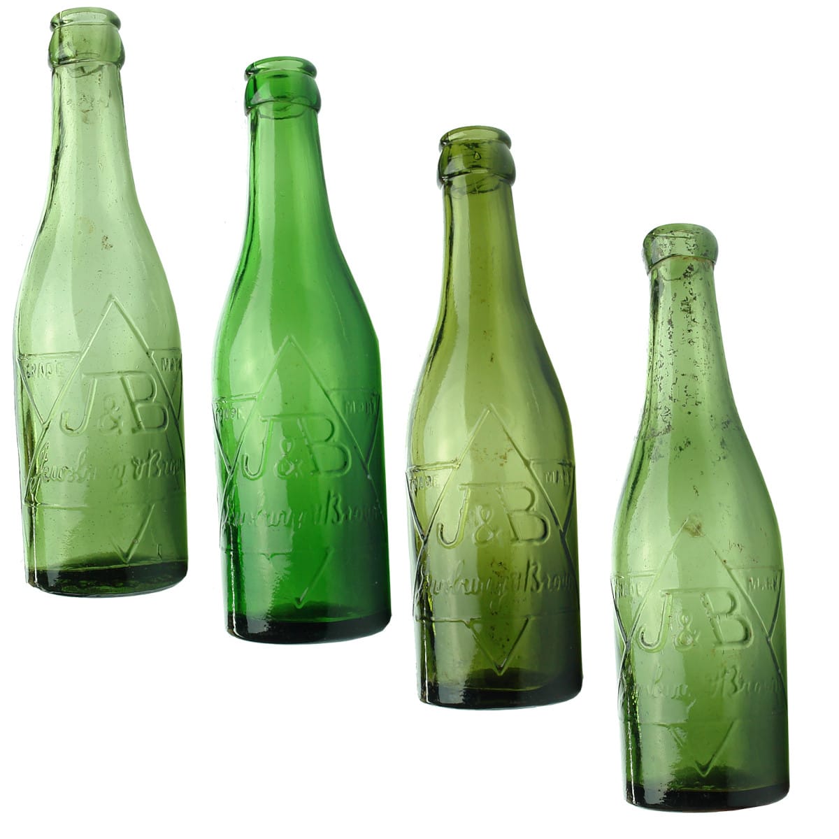 4 Green Jewsbury & Brown Bottles. 3 x crown seal and 1 blob top. Champagne shapes. Applied tops. 6 oz. (UK)