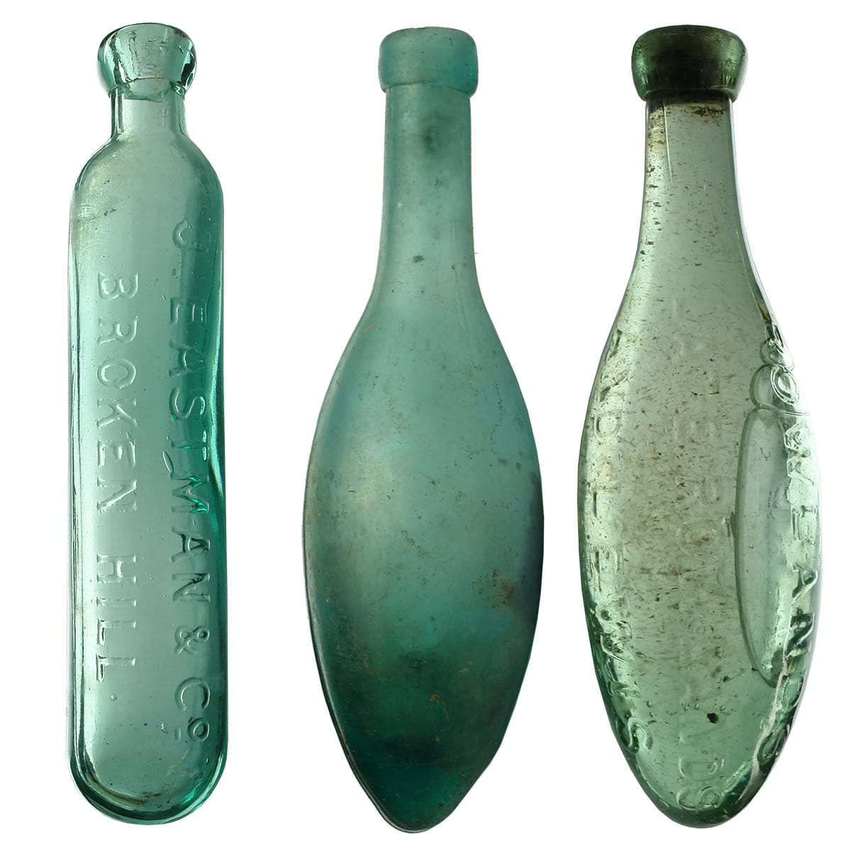 3 Bottles. J. Eastman & Co., Broken Hill maugham; Plain darker torpedo with big seams; Rowlands, late Rowlands & Lewis Torpedo with original contents.