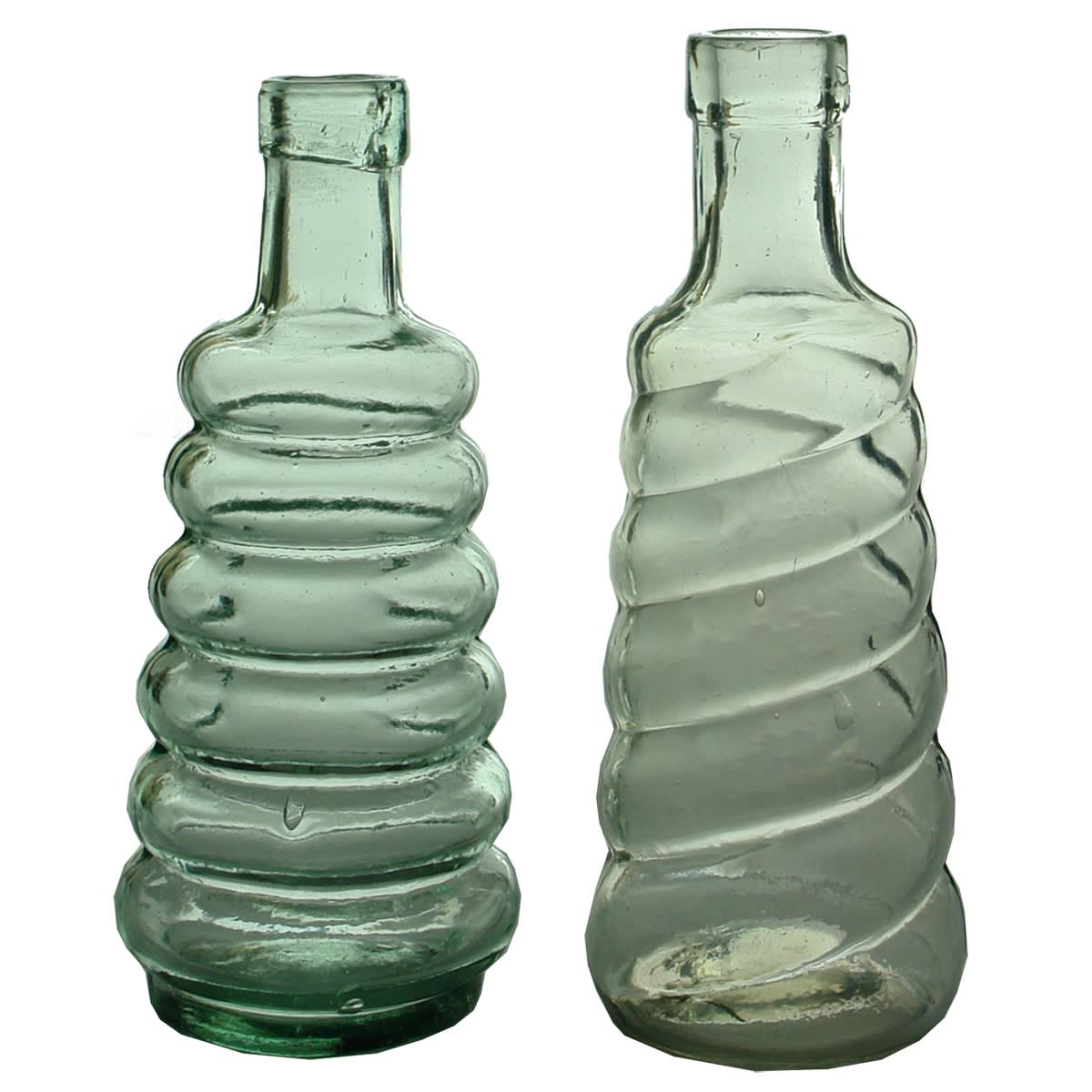 2 Beehive type Pepper sauces or salad oils. Clear & Aqua.