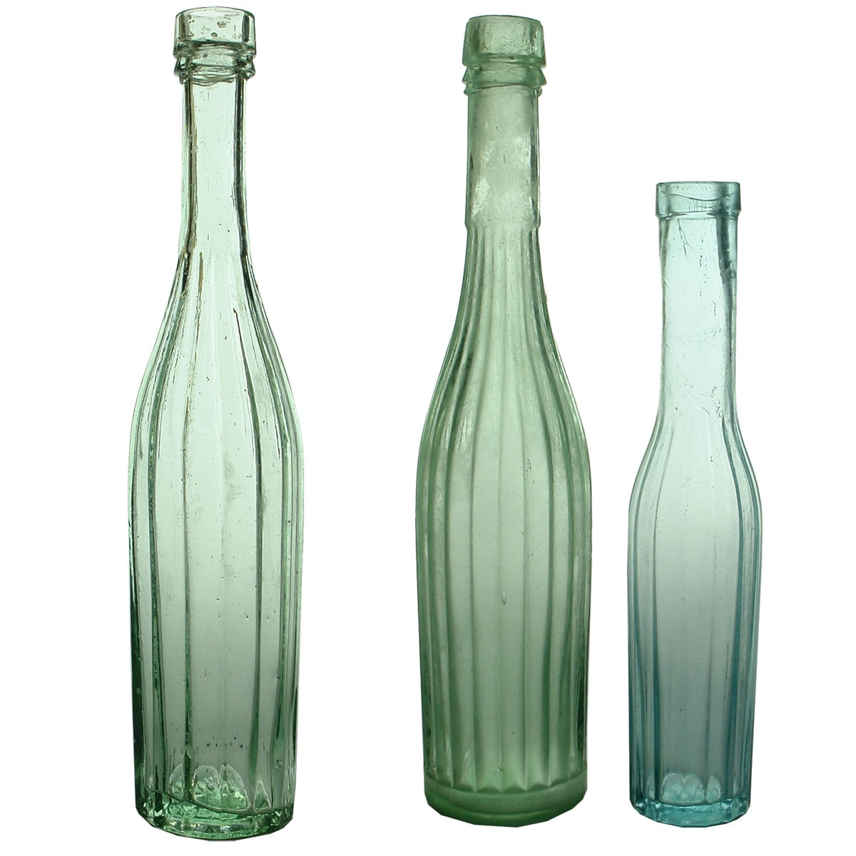 3 Fluted salad oils. 10 & 5 oz with label spaces. Unusual small one of about 2-3 oz.