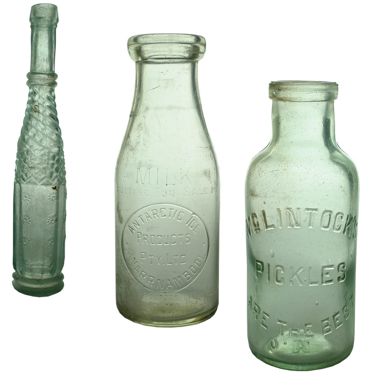3 Household Bottles: Daisy pattern small Whirley salad oil; Antarctic Ice Products Warrnambool Milk; McLintock's Pickles.