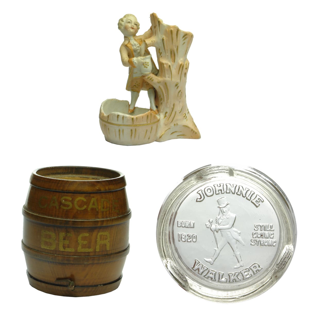 3 Items. Pottery Matchstriker & Liquor Advertising. German Fairing Matchstriker; Cascade Beer Huon Pine Barrel; Johnnie Walker Ashtray.