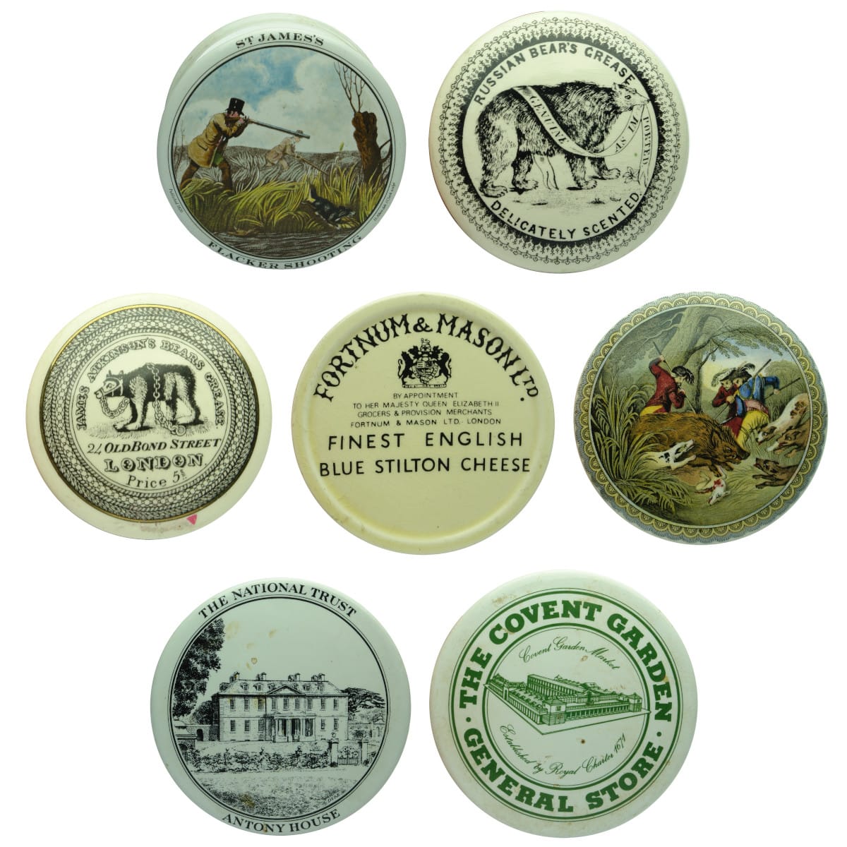 Pot Lids. 1. St James's, Flacker Shooting with Base. 2. Reproduction Bears Grease, Gladstone Pottery Museum. 3. Reproduction James Atkinson's Bears Grease, London. 4. Fortnum & Mason Ltd Blue Stilton Cheese Jar Lid. 5. Large Boar Hunt Reproduction Prattware Pot Lid. 6. The National Trust, Antony House Pot Lid. 7. The Covent Garden General Store Pot Lid. (United Kingdom)