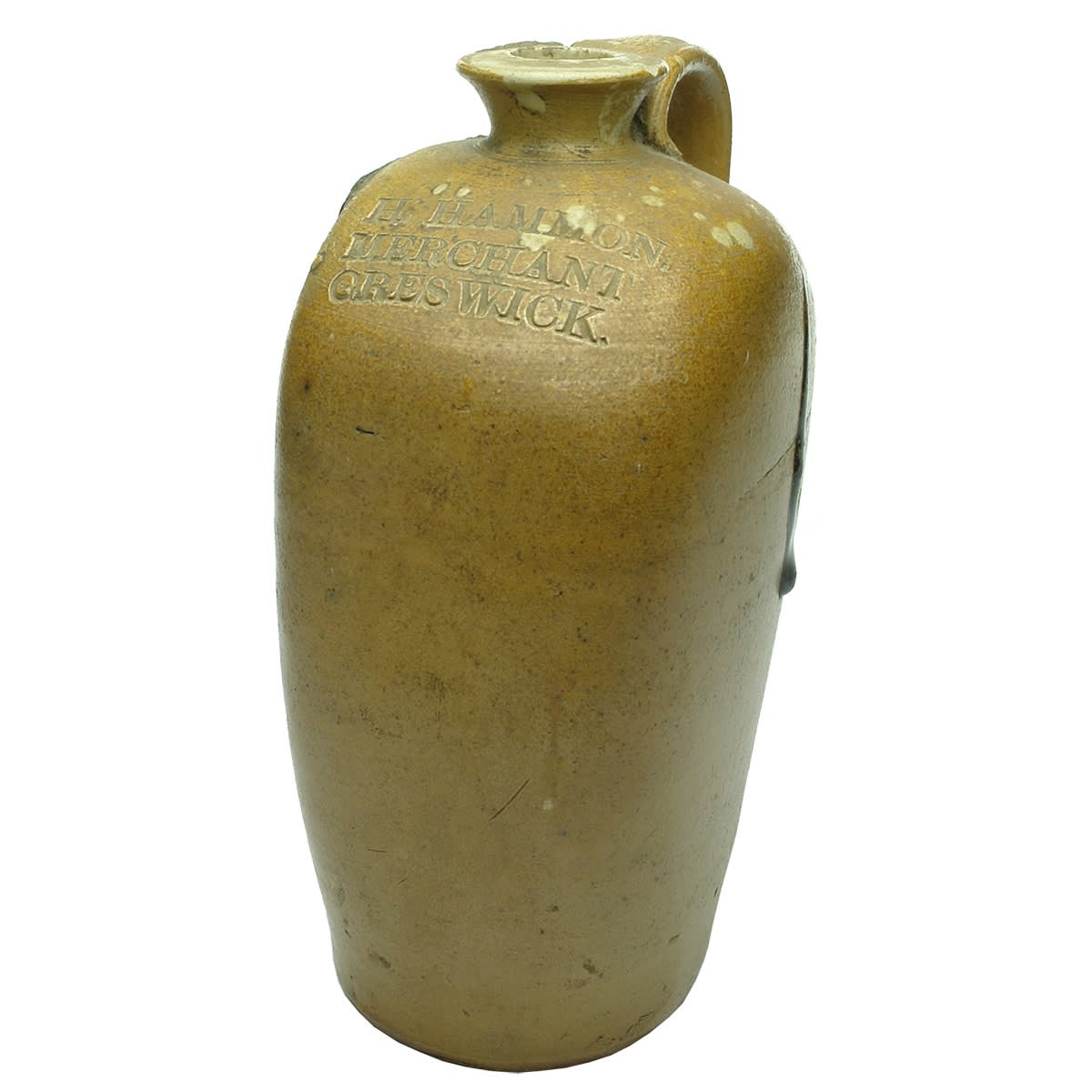 Whisky Jug. H Hammon, Merchant, Creswick. Flat sided salt glaze jug. Impressed. (Victoria)