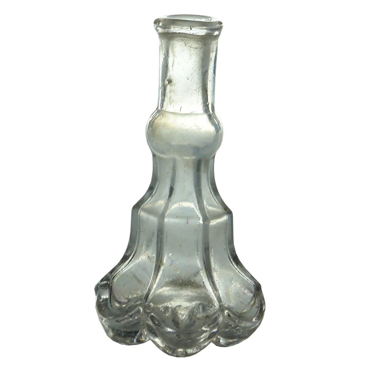 Fancy small bottle known as a Crosse & Blackwell Essence. Faint Pontil type scar on the wider edges of the base. Clear. 2 oz.