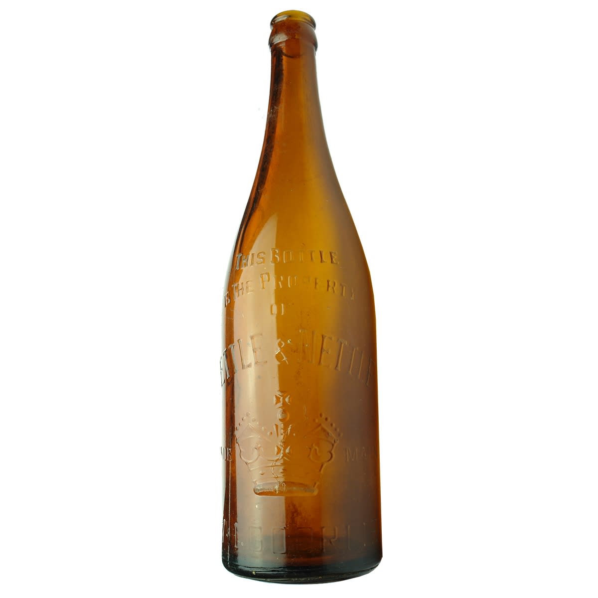 Crown Seal. Nettle & Nettle, Kalgoorlie. Crown. Amber. 26 oz. (Western Australia)
