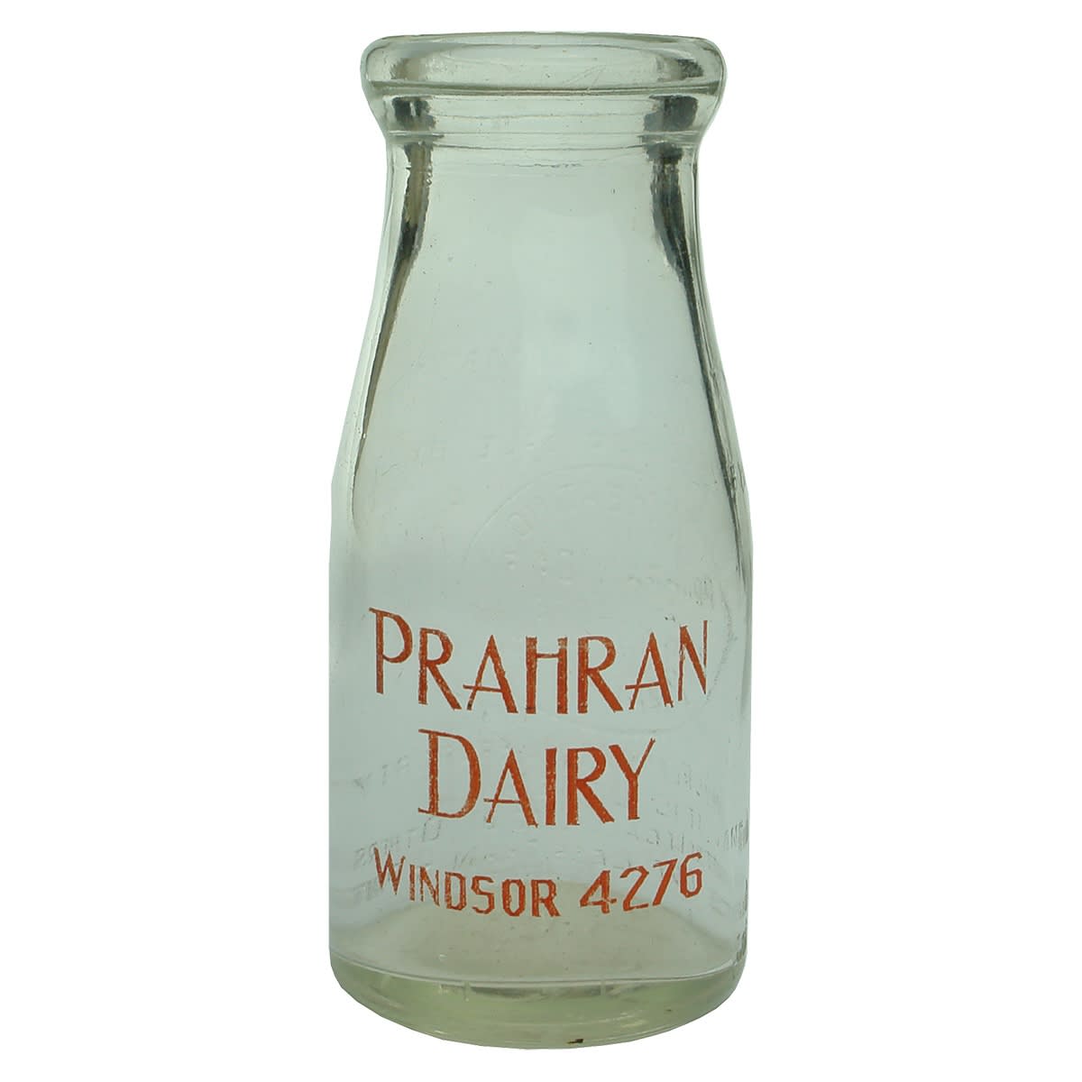 Milk. F. W. Keating, Prahran Dairy, Prahran. Embossed and Red Print. Wad Lip. Clear. 1/2 Pint. (Victoria)