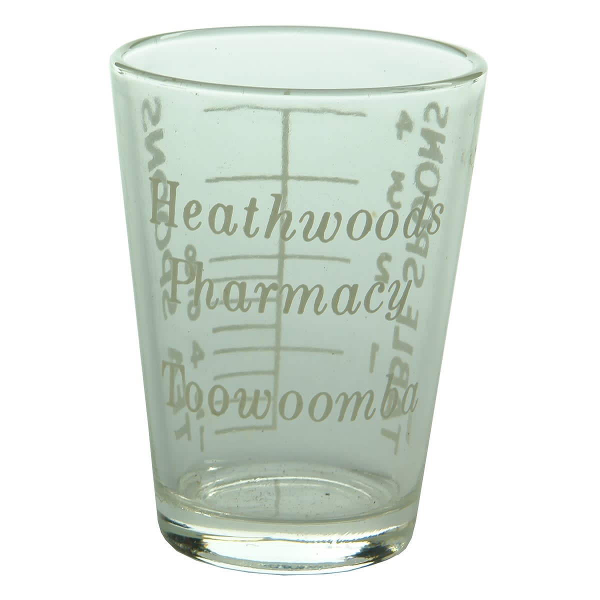 Dose Cup. Ceramic Label Heathwoods Pharmacy Toowoomba. 4 Table Spoon size. (Queensland)