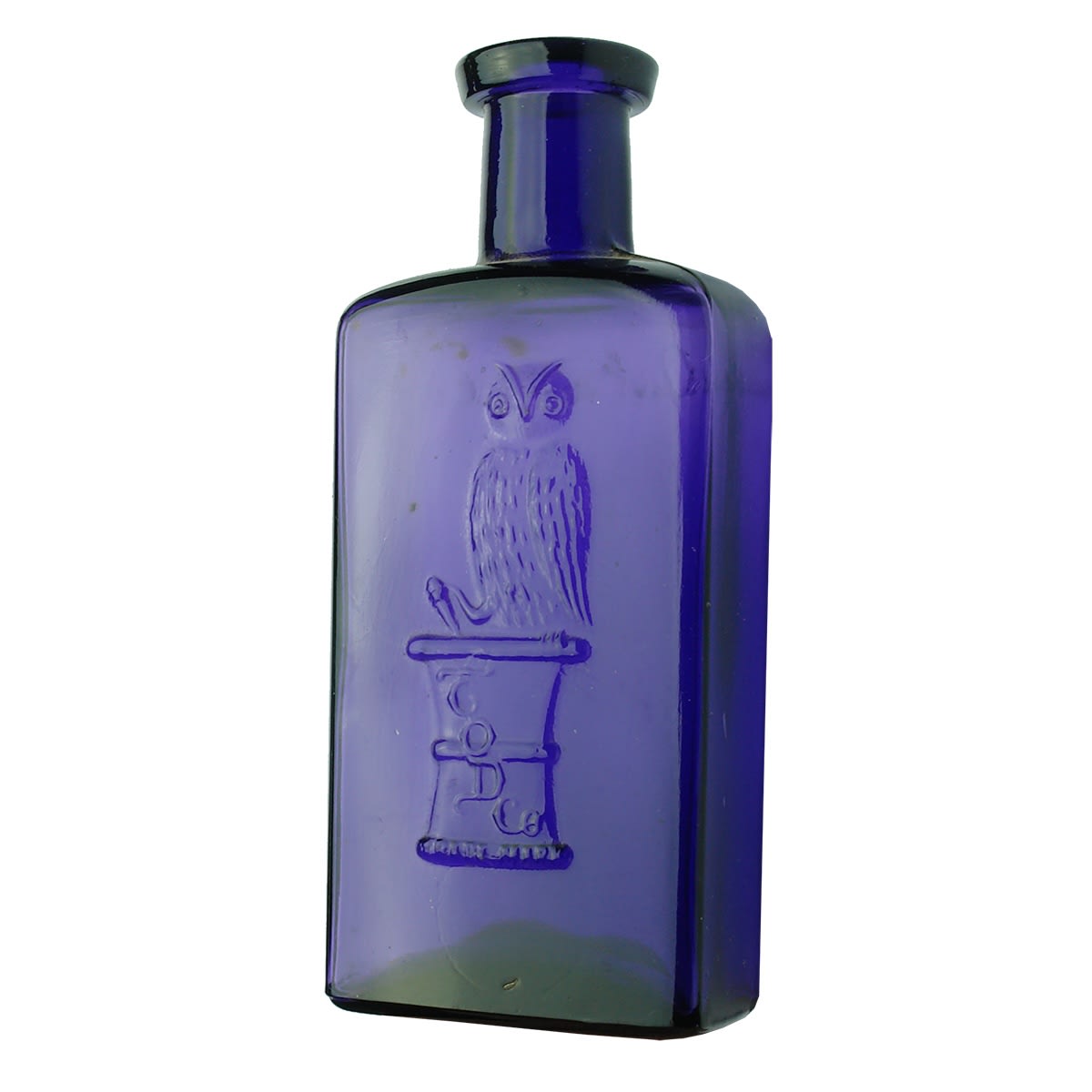 Medicine. The Owl Drug Co. One Wing. Dark Purple. Zapped? Rounded Oblong. 141 mm. (USA)