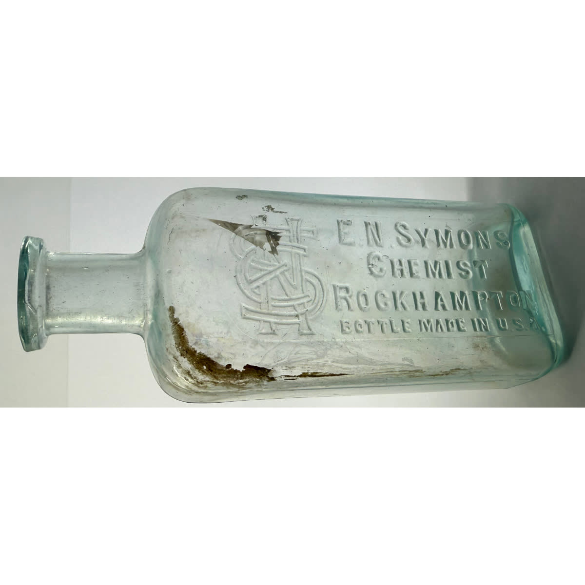 Chemist. E. N. Symons, Rockhampton. Whitall Tatum. Manhattan Oval shape. Aqua. 4 oz. 137 mm. (Queensland)