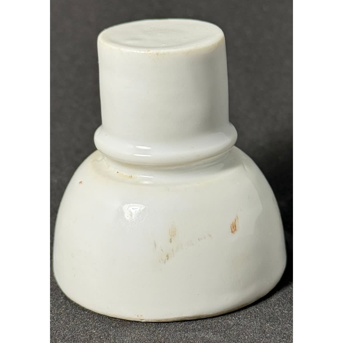 Insulator. White porcelain bell. 54 mm.