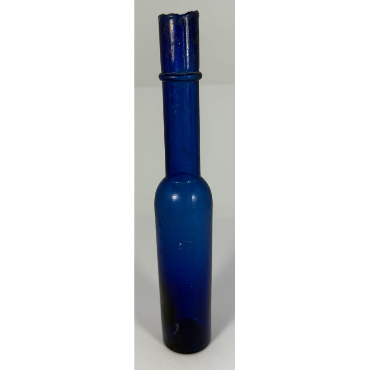 Castor Oil. Small skinny shear top castor oil. Cobalt Blue. About 2-3 oz.