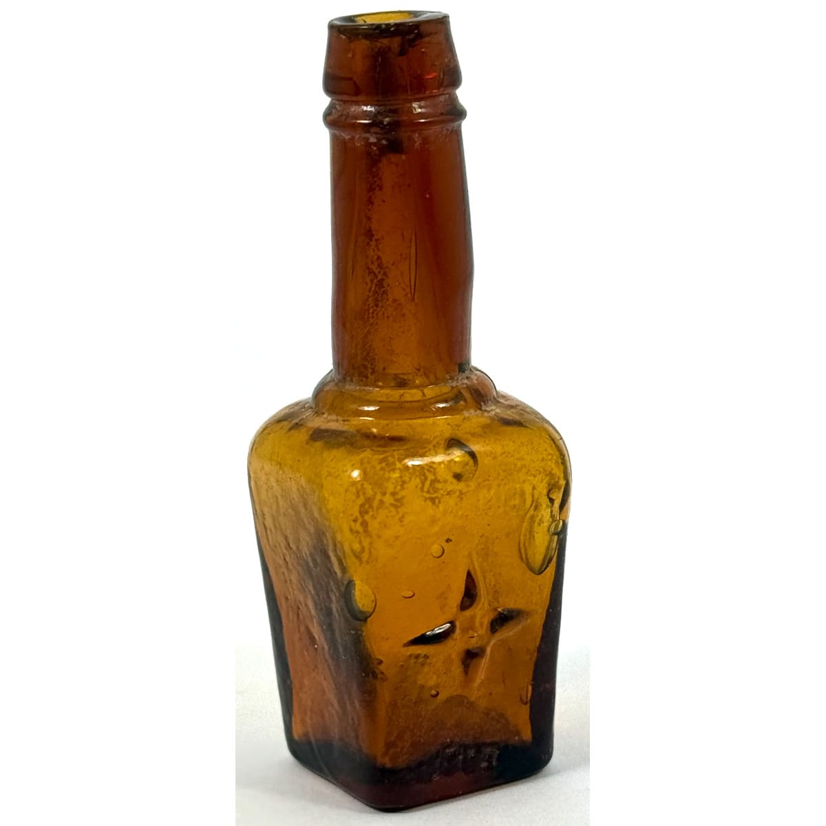Sample sized Maggi amber bottle. Large star logo. 68 mm.