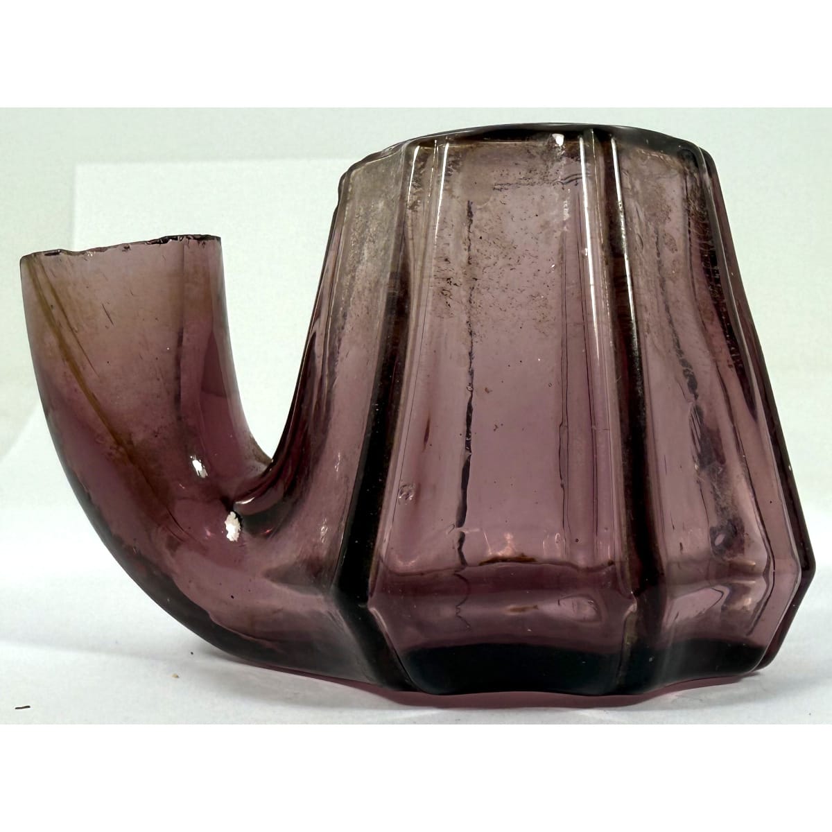 Ink. Teakettle type. Ribbed Sandwich with 8 concave sides, deeper grooves separating. Amethyst. 2 oz. Ground lip.
