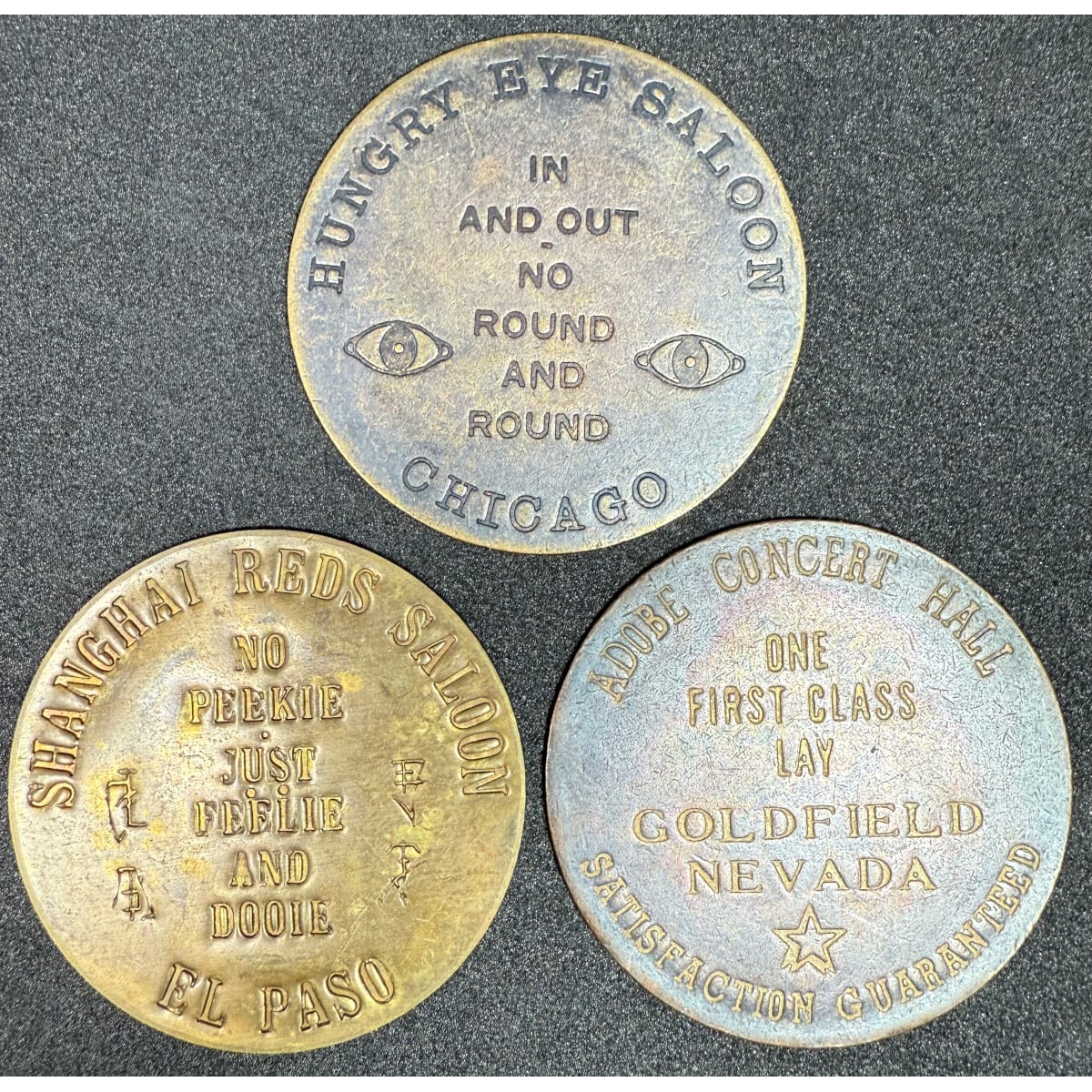 3 Replica American Brothel Tokens: Chicago Hungry Eye Saloon; Shanghai Reds Saloon El Paso; Adobe Concert Hall Nevada. (USA)
