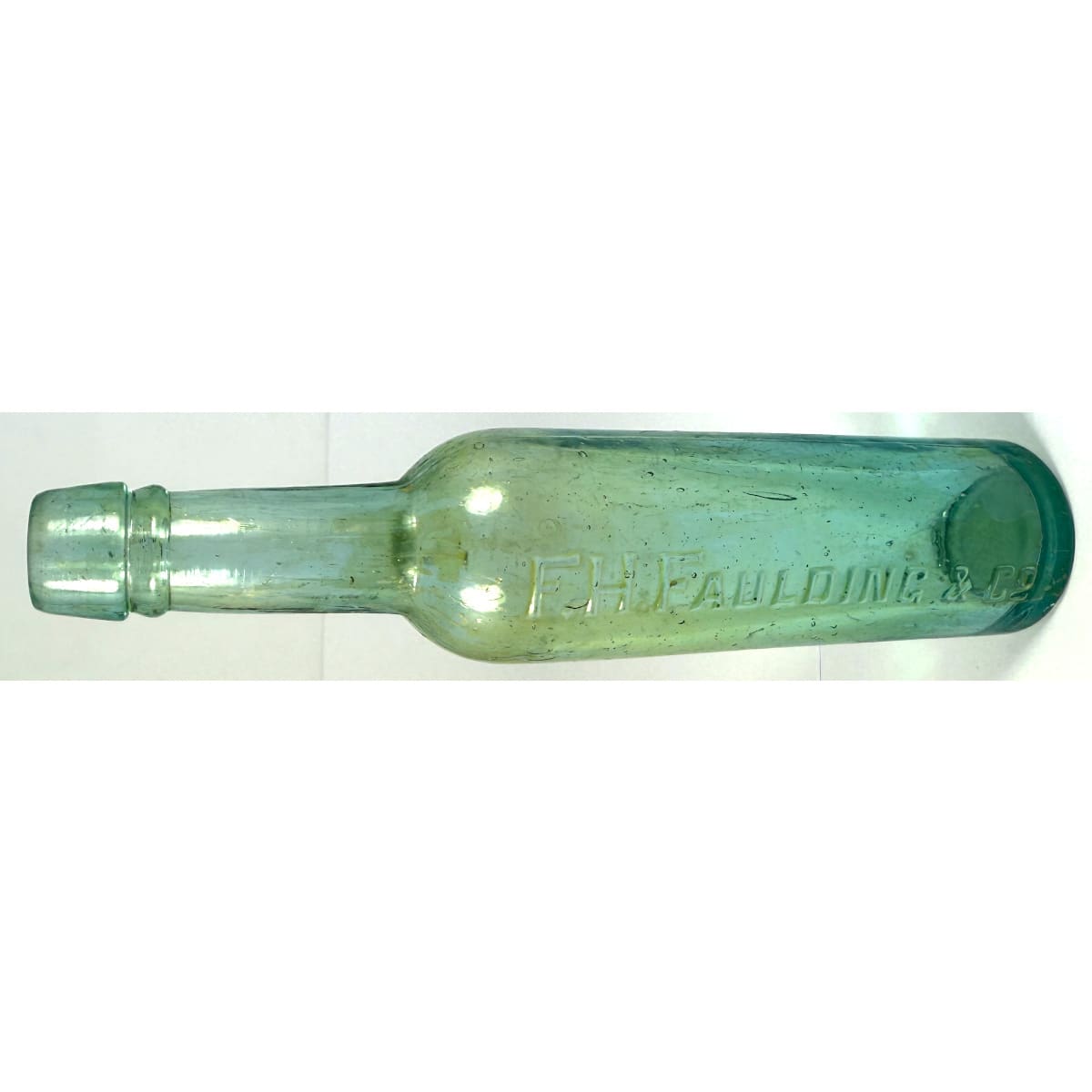 Castor Oil. F. H. Faulding & Co. Aqua. 2 oz. 164 mm. (South Australia)