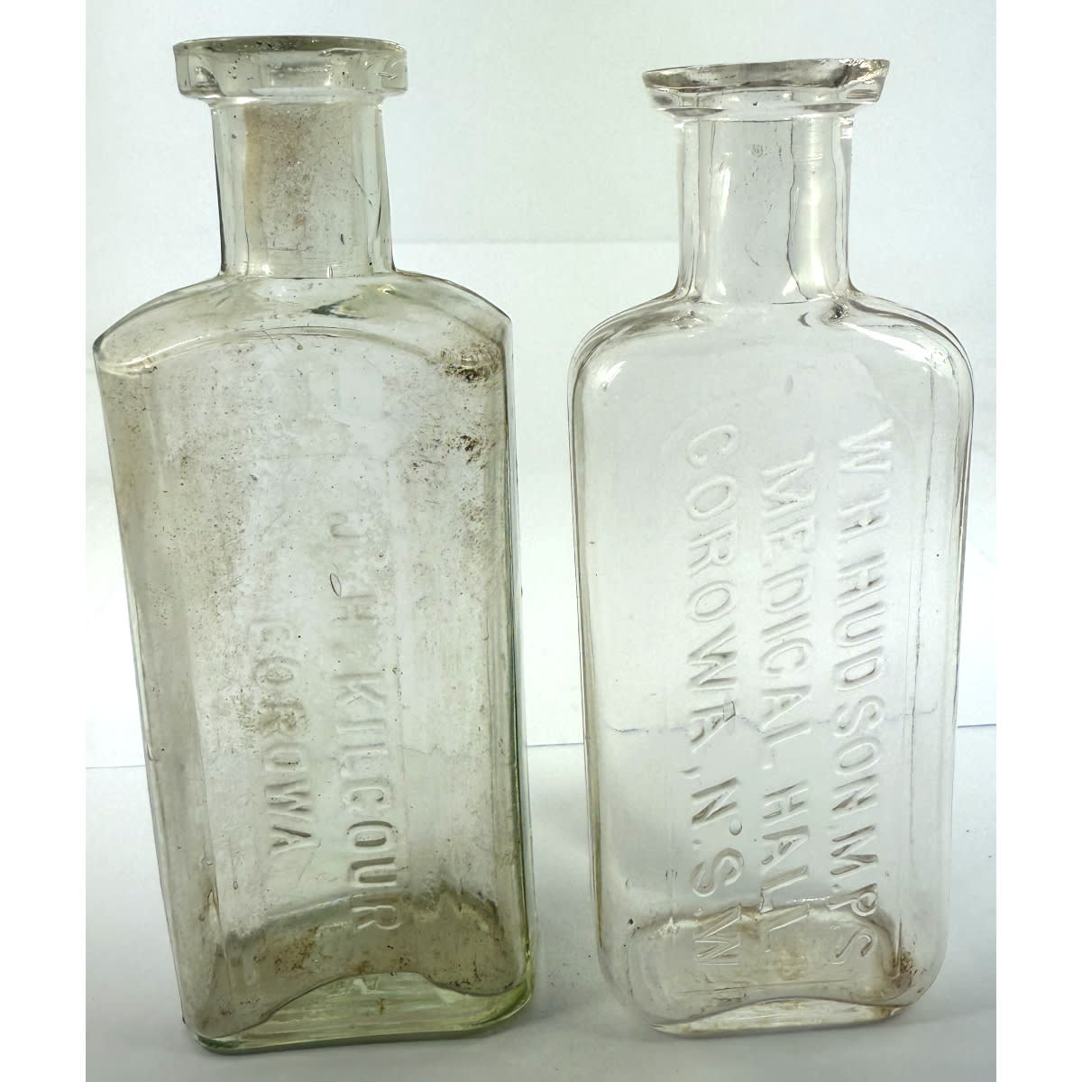 2 Corowa Chemists: J. H. Kilgour; W. H. Hudson MPS Medical Hall. Clear. 2 oz. 115 & 110 mm. (New South Wales)