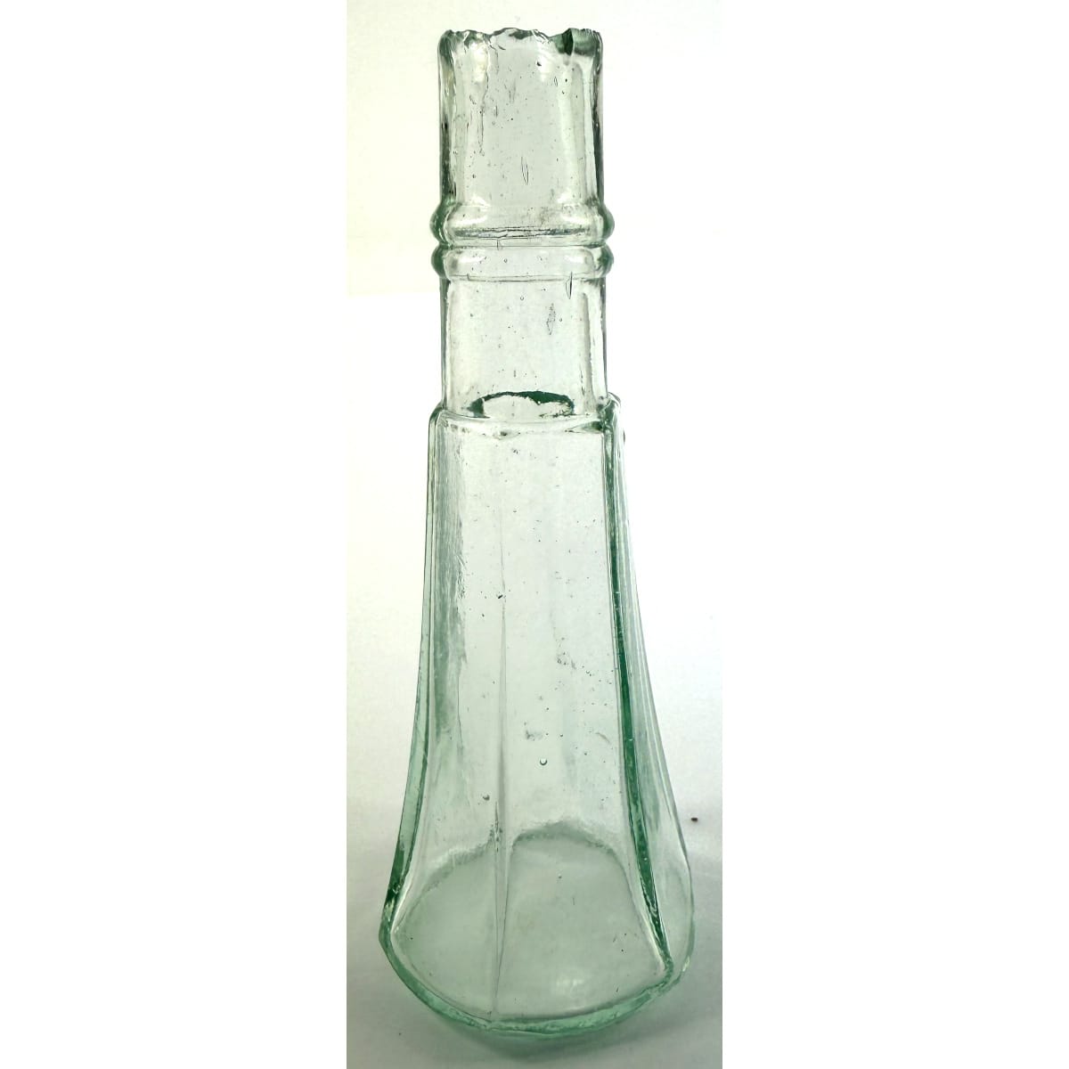 Sample Goldfields shape. Tapered hexagonal. Double ring in neck. Shear lip. Aqua. 1 oz. 102 mm.