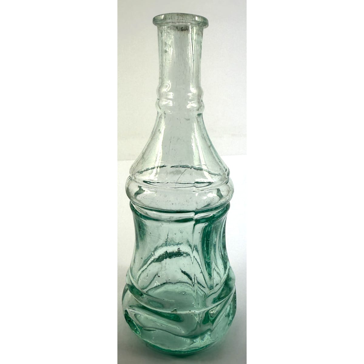 Goldfields Salad Oil. Hourglass shape. 6 thin panels and 1 wider label panel to middle. Aqua. 4 oz.