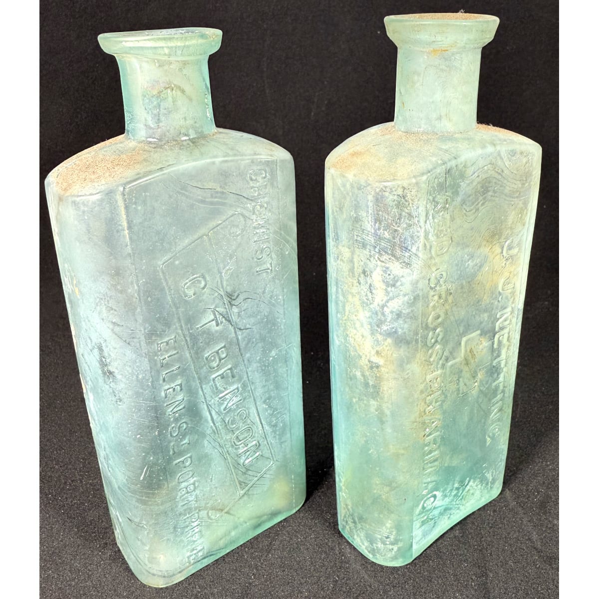2 Port Pirie Chemist Bottles: J. J. Netting, Red Cross Pharmacy; C. T. Benson, Ellen St. Both about 5 oz 150-151 mm. (South Australia)