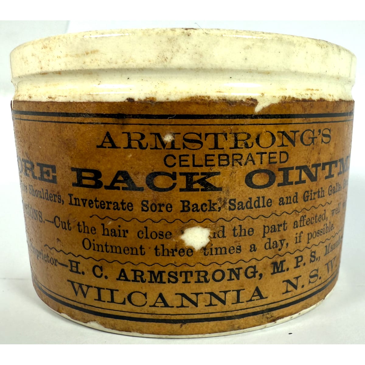 Ointment Pot. Original label for Armstrong's Sore Back Ointment. H. C. Armstrong, Wilcannia, NSW. (New South Wales)