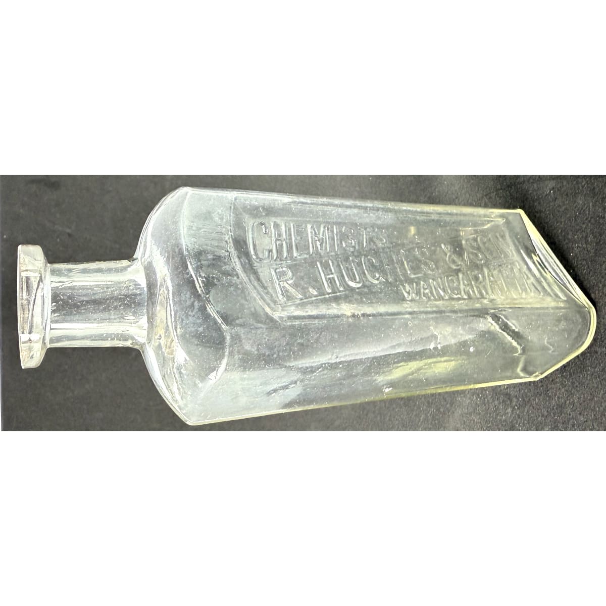 Chemist. R. Hughes & Son, Wangaratta. Clear. 8 oz. 167 mm. (Victoria)