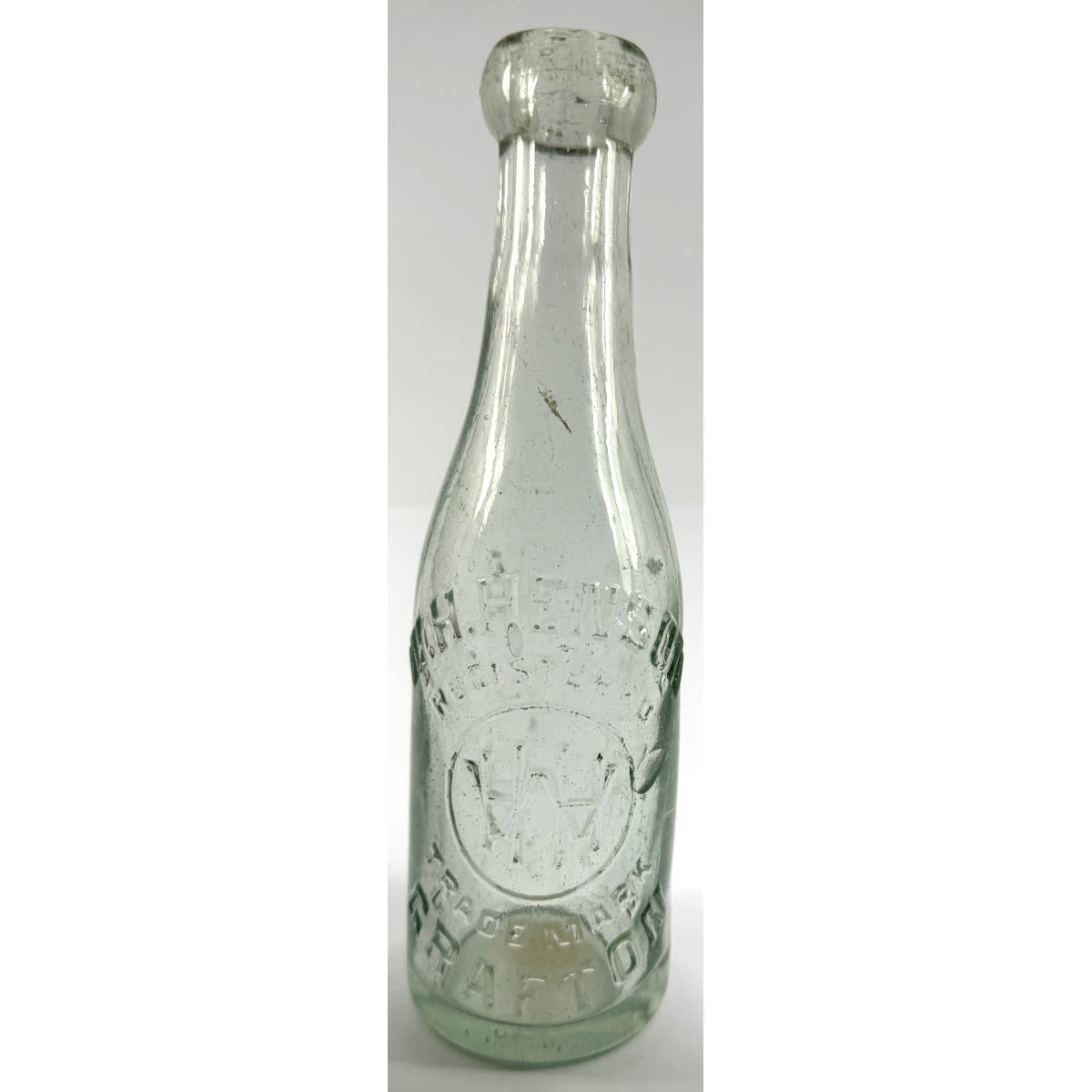 Blob top. W. H. Henson, Grafton. No glass makers marks. Very pale aqua. 6 oz. 192 mm. (New South Wales)