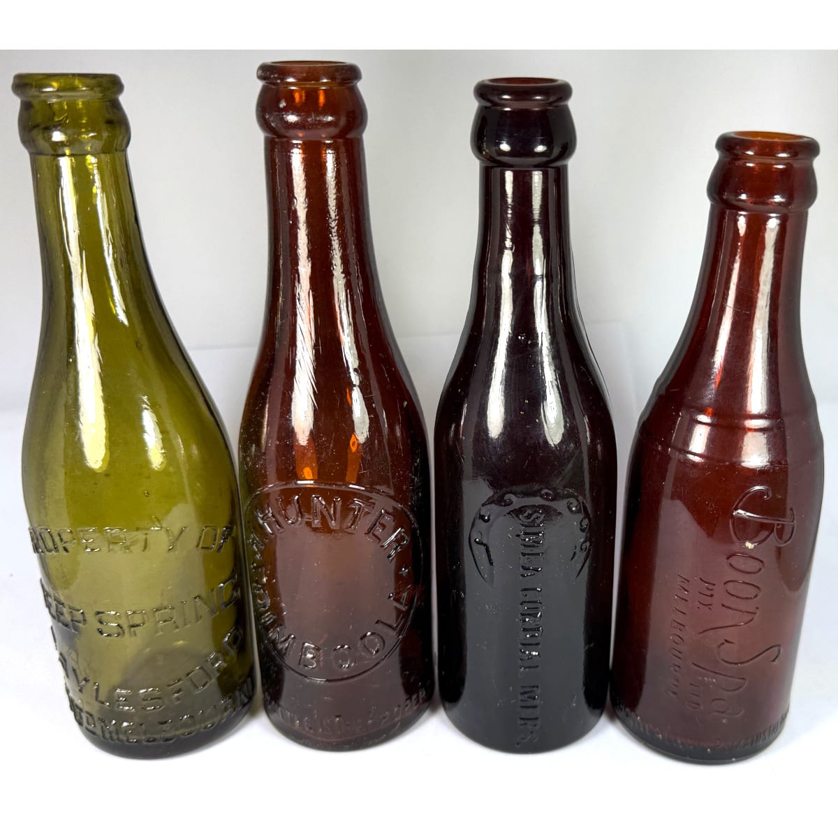 4 small Coloured Crown Seals: Deep Spring, Daylesford, O. T. Ltd, Melbourne; H. Hunter, Dimboola; Simla Cordial Manufacturers; Boon Spa Pty Ltd. 6 oz. (Victoria)