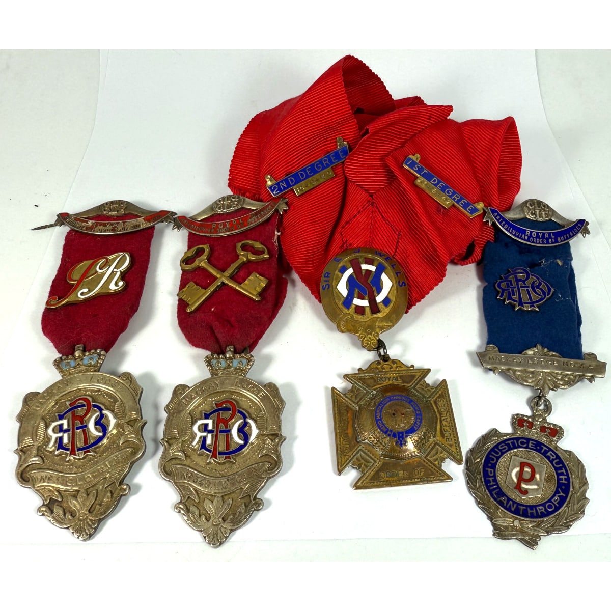Group of Medals and bars from Royal Antediluvian Order of Buffaloes RAOB. All for E. J. Wells, Mackay Lodge. 1940s. With ribbons etc. (Queensland)