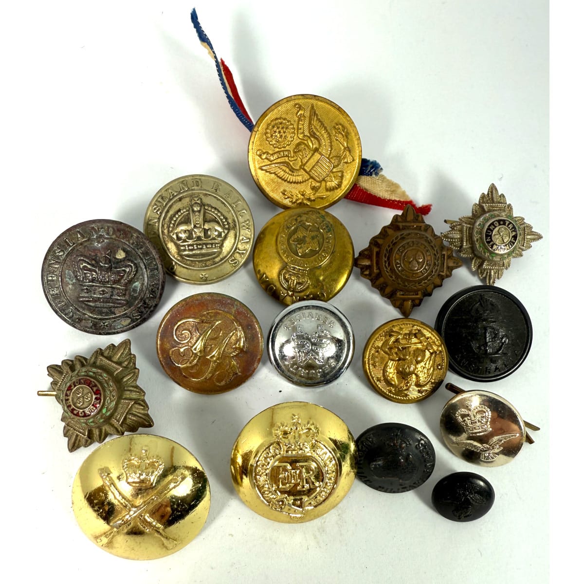 Buttons, Badges & Cufflinks. Military, Police, Railways. Interesting group from around the world. Couple of nice Queensland Railways with different crowns.