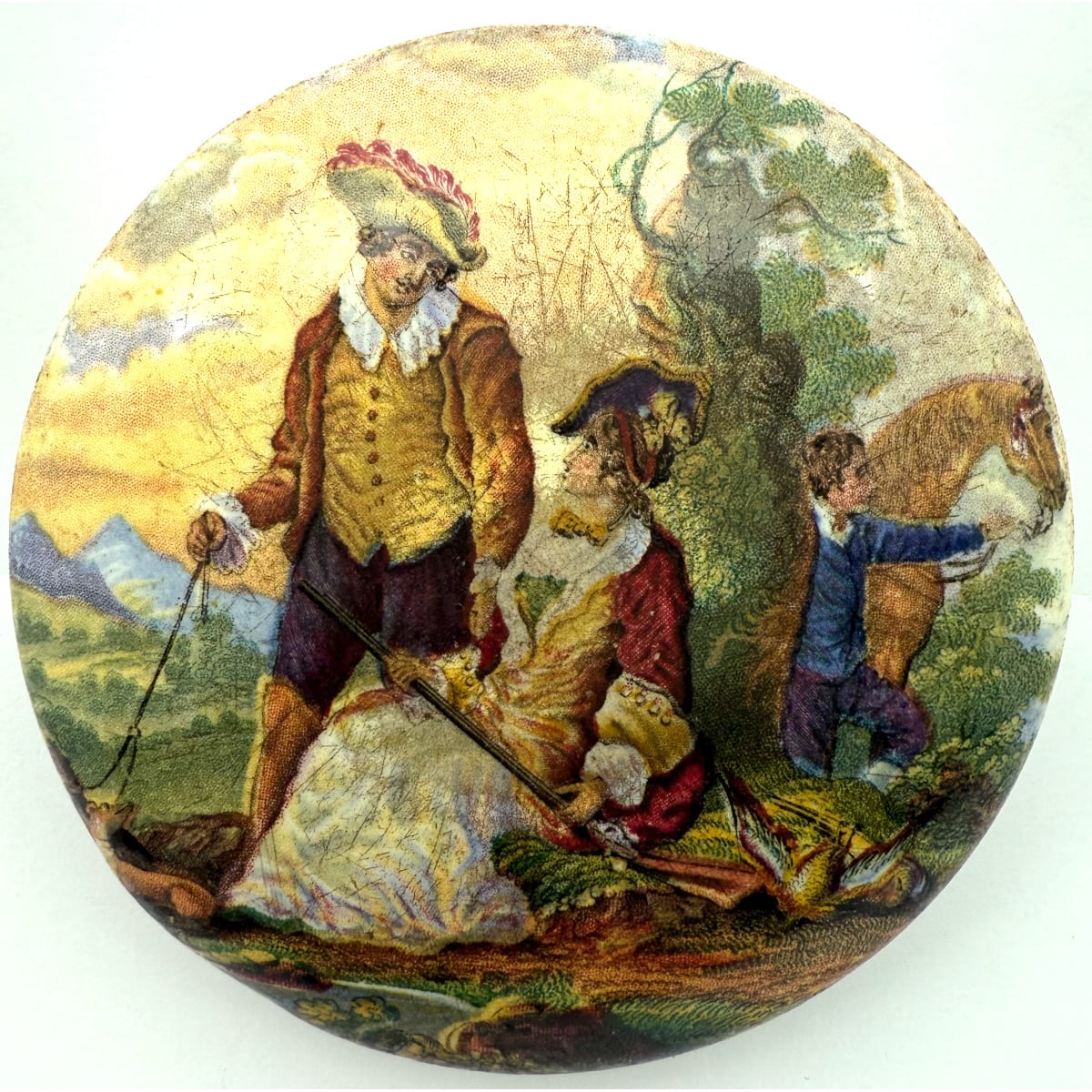 Pratt Lid. Lady with Gun and shot birds, Man with dogs and boy holding a horse behind a tree. Prattware.