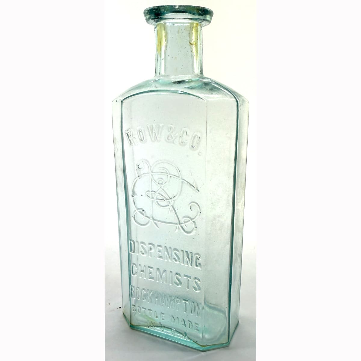 Chemist. Row & Co, Dispensing Chemists, Rockhampton. Monogram. Whitall Tatum. 8 oz. 165 mm. (Queensland)