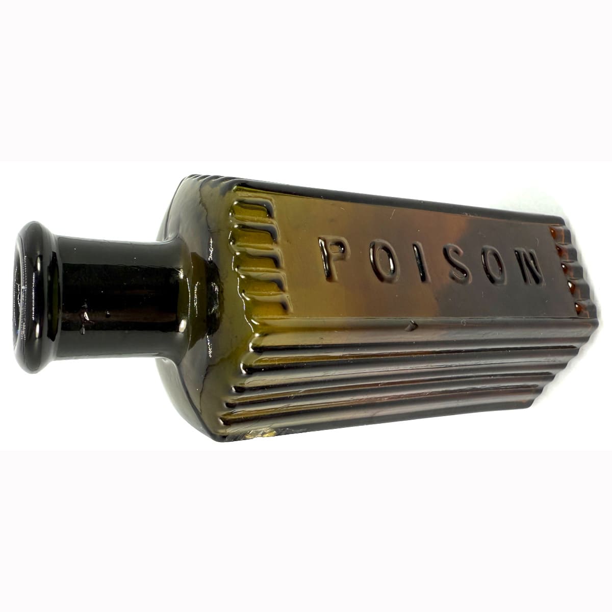 Poison. Hexagonal. Embossed poison to front panel and vertical ribs to panels either side. Squat shape. Colour is amber at the bottom and basically green at the top. 3 oz 113 mm.