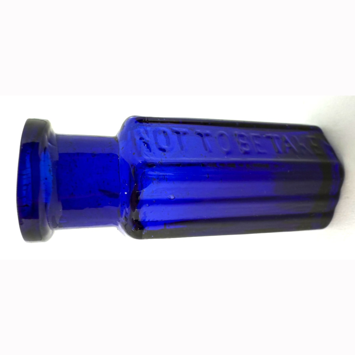 Poison. Hexagonal Not To Be Taken. Ribs. 1 Dr to base. Cobalt Blue. 1 Dram, 42 mm. Tiny but a lot wider than the last lot.