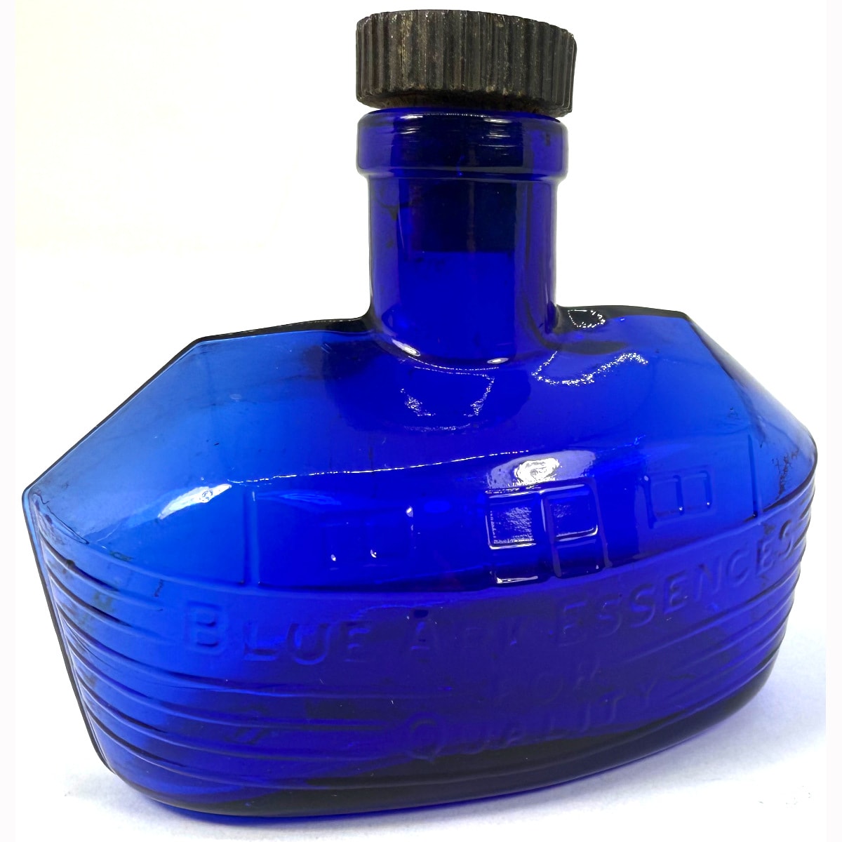 Essence. Figural Blue Ark Essence. Noahs Ark shape. Original Cork with top printed Blue Ark. Alfred Lawrence & Co Melbourne. Cobalt. 2 oz. (Victoria)