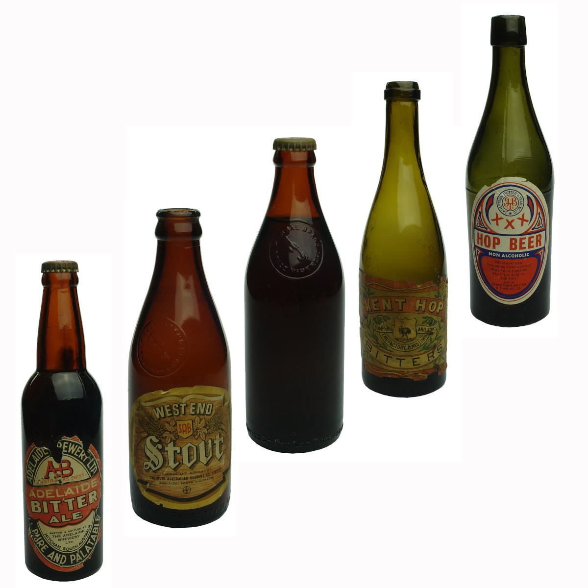 5 small South Australian Bottles: Labelled Adelaide Brewery Bitter Ale; Labelled small West End Stout; Medium pickaxe full with contents; 2 plain bottles with labels: Humphris Kent Hop Bitters & Jamestown Hop Beer.