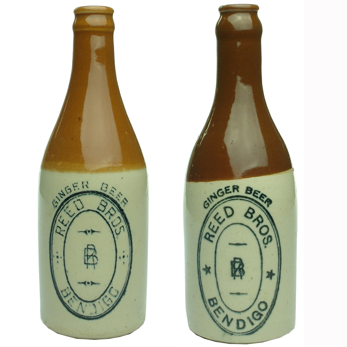 Pair of Reed Bros Bendigo Crown Seal Ginger Beers. Red & Chocolate tops. (Victoria)