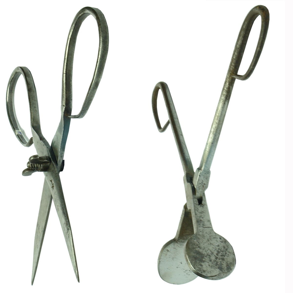 2 Hand forged tools: Scissors and a press or iron for collars and other small things.