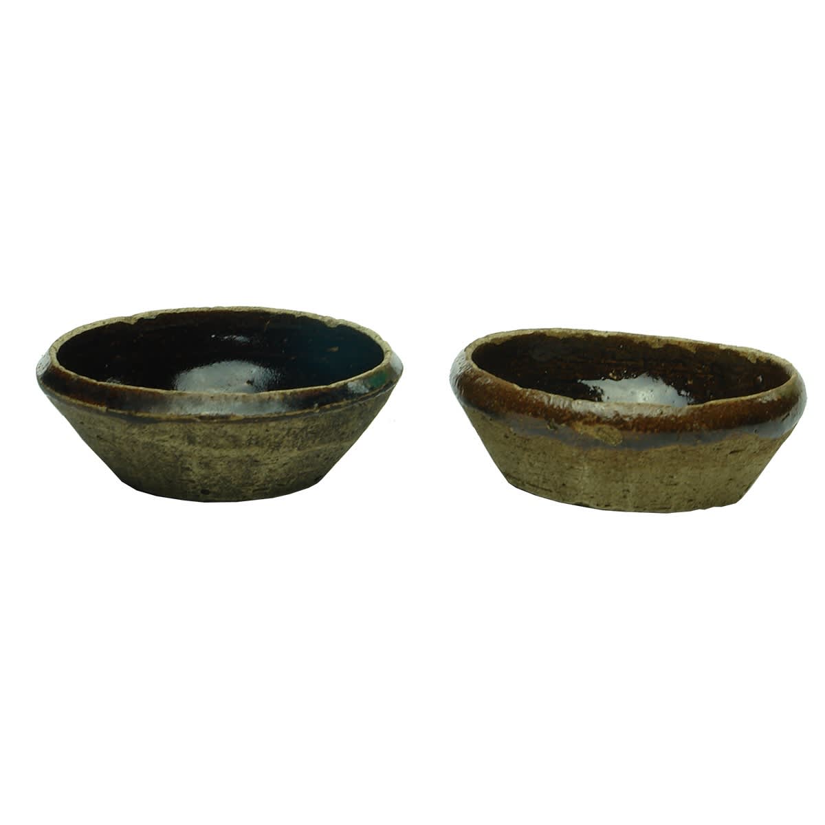 Chinese. Pair of little bowls with chocolate inner glaze.