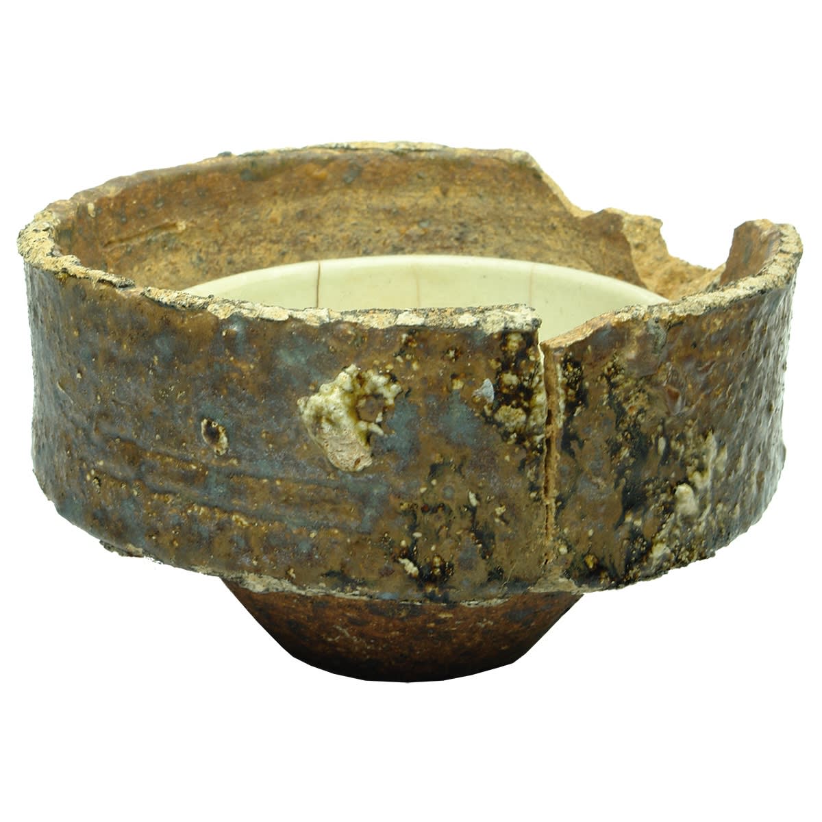 Chinese. Song dynasty bowl stuck to kiln furniture (called a saggar). 185 mm diameter.